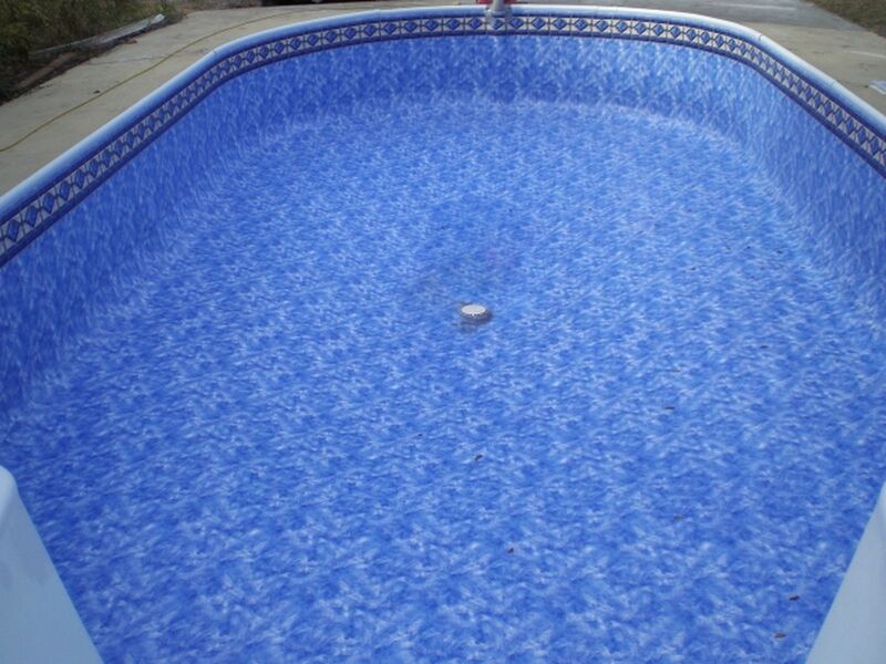 An Above Ground pool Cleaned and Filled With Water